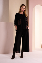 Load image into Gallery viewer, Wide legged trousers with Choko print cuff
